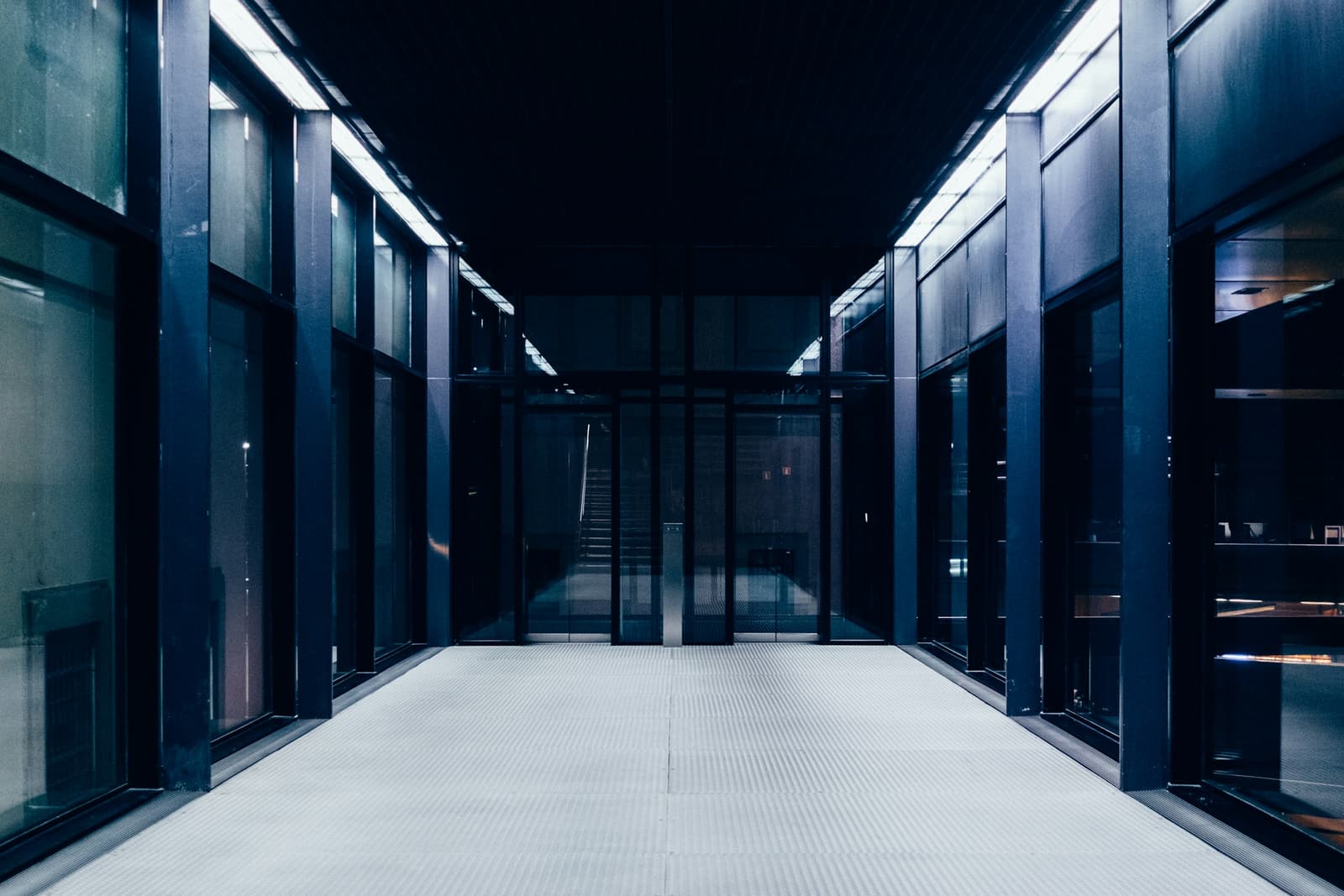 A data center aisle lined with server cabinets